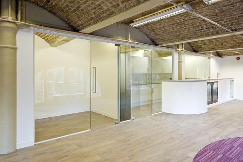 Single glazed partition system in historic building